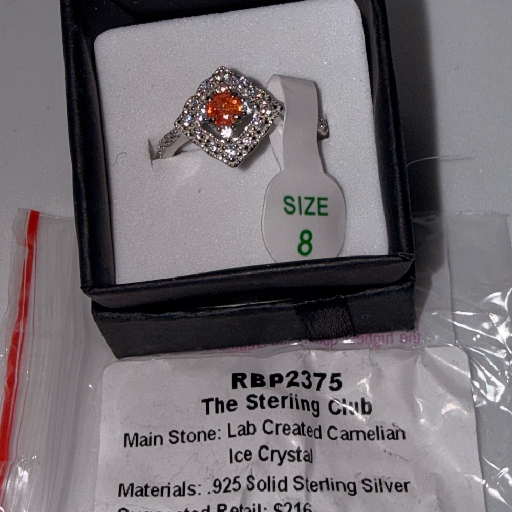 Sterling Silver Ring with Orange Center Stone